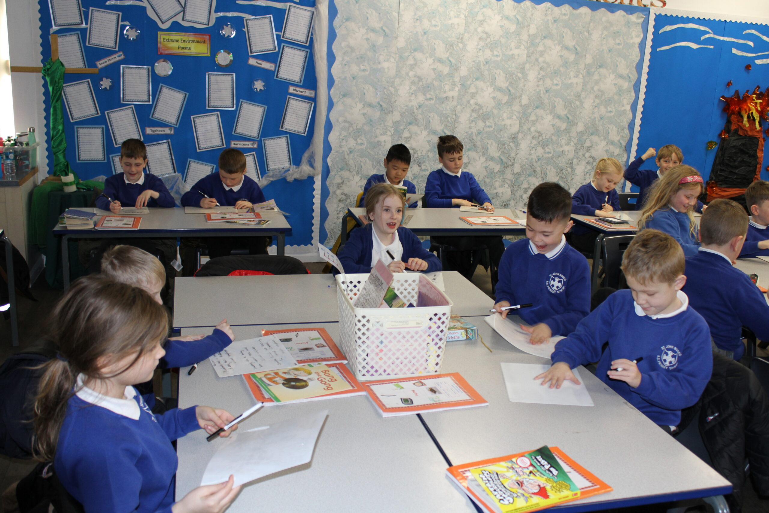 pupils in a classroom doing lesson at their desk