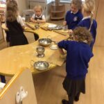 young pupils learning to make bread